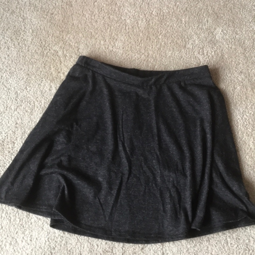 Short, flowing skirt.
